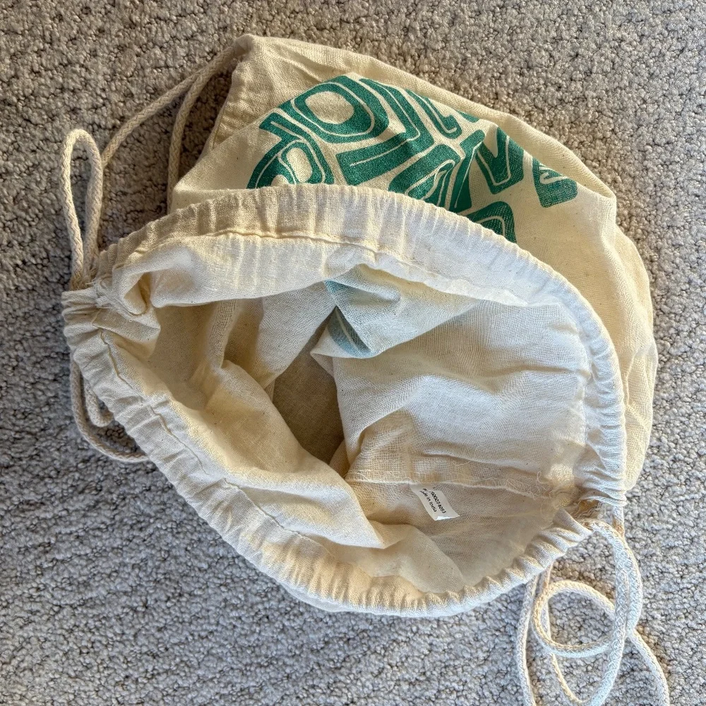 LollaPalooza backpack drawstring bag tan teal
